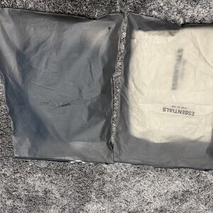 new essentials fear of god shorts size smalls